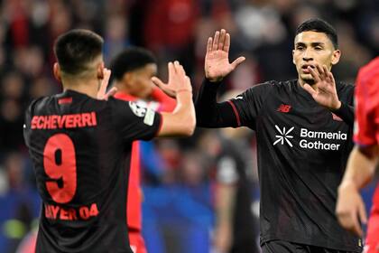Ezequiel Fernández y Claudio Echeverri, antes del temporal