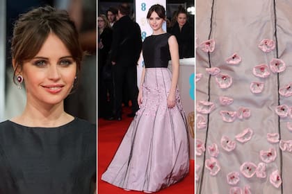 Felicity Jones, con una look bicolor con falda en rosa palo con pequeñas flores bordadas y cuerpo negro, de Christian Dior Alta Costura