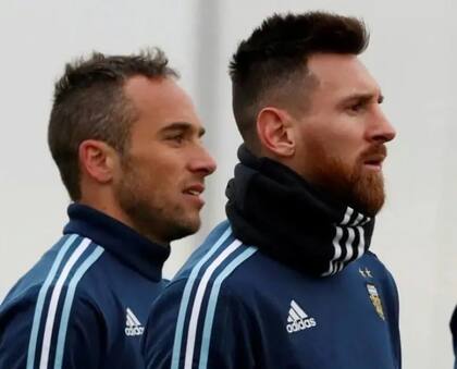 Fernando Belluschi y Lionel Messi en la selección argentina