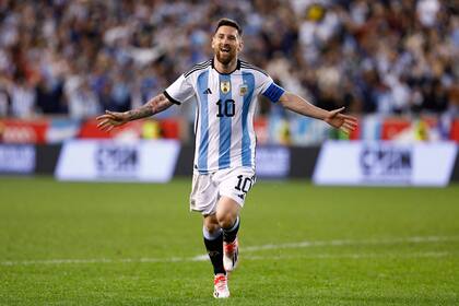 (FILES) In this file photo taken on September 27, 2022 Argentina's Lionel Messi celebrates his goal during the international friendly football match between Argentina and Jamaica at Red Bull Arena in Harrison, New Jersey. (Photo by Andres Kudacki / AFP)