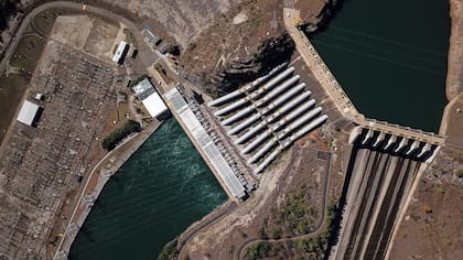 (FILES) This file photo taken on July 19, 2021 shows an aerial view of the Furnas Dam in Sao Jose da Barra, Minas Gerais State, Brazil. (Photo by Douglas Magno / AFP)