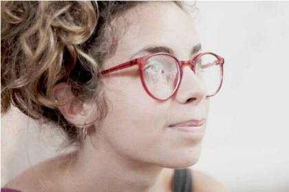 Florencia Caterina (27). Vive en el edificio.