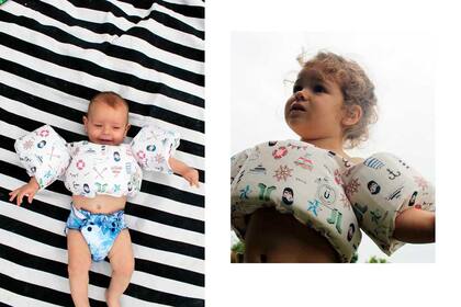 Flotador muy seguro que prende atrás $1100 y pañal de agua reutilizable $620 de Güima /