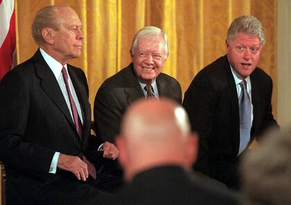 Ford, Carter y Clinton durante un evento en la Casa Blanca en 2000 (Stephen Crowley/The New York Times)
