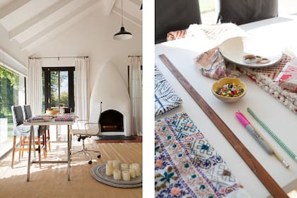 Mesa con caballetes metálicos, banquetas con funda, alfombra (todo de Alicia Deco) y silla ‘Aluminum’.