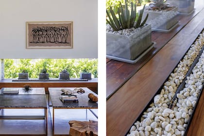 El hogar tiene encendido a gas escondido entre piedras blancas.