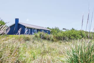 Deco en azul y blanco para entregarse al descanso en Rincón de Cobo.