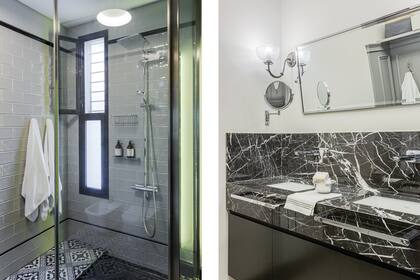 En el baño principal, mesada con bacha integrada de mármol Marquina, piso calcáreo ‘París’ (Cerámica Piú), box de ducha revestido con azulejos (SBG) y grifería ‘Crometta’ con termostato (Hansgrohe).