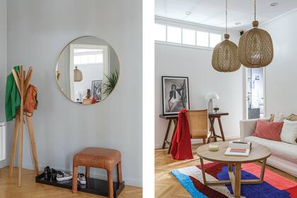 El recibidor se definió con un conjunto práctico y minimalista: bandeja laqueada negra (Arquitectura Danon Glaubart), banco, perchero y espejo (Tupé Home).