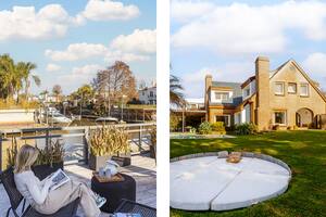 Fotos de una casa en el Boating Club con jardín y deck al río.