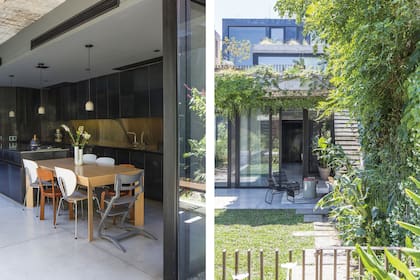 Aberturas de PVC negras (Perfiles y Servicios) en la conexión con el jardín.