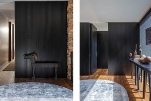 La alfombra ovalada de seda gris plata y celeste (Mihran) ofrece dinamismo al hall que antecede al dormitorio principal.