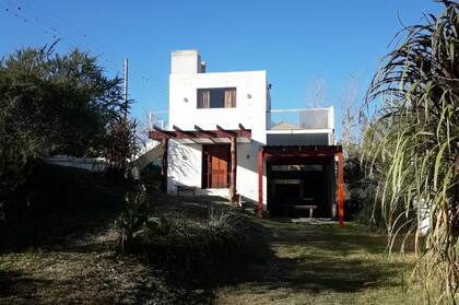 Frente de una de las cabañas, en Villa Carlos Paz.