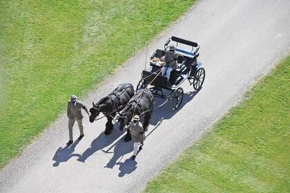 Fue entrañable la
presencia de sus dos caballos favoritos, Balmoral
Nevis y Notlaw Storm, al tiro de su carruaje