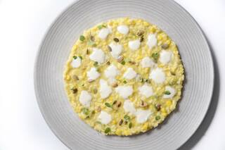 Risotto de maíz, queso de cabra y semillas de zapallo