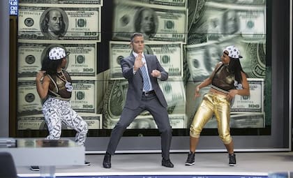 George Clooney en El maestro del dinero; el actor dijo que una fortuna que no se comparte no sirve para nada