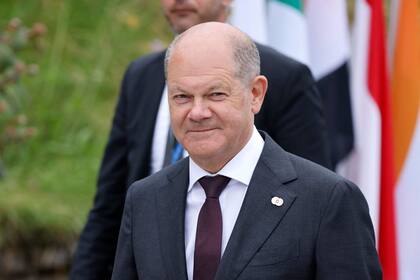 German Chancellor Olaf Scholz arrives to take part in a Summit on Peace in Ukraine at the luxury Burgenstock resort, near Lucerne in central Switzerland, on June 15, 2024. The two-day gathering brings together Ukrainian President and more than 50 other heads of state and government, to try to work out a way towards a peace process for Ukraine -- albeit without Russia. (Photo by Ludovic MARIN / AFP)�