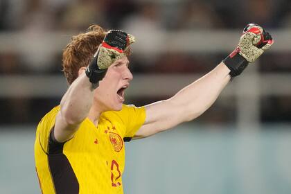 Germany's goalkeeper Konstantin Heide reacts after making a safe in a penalty shootout against France during their U-17 World Cup final soccer match at Manahan Stadium in Surakarta, Indonesia, Saturday, Dec. 2, 2023. (AP Photo/Achmad Ibrahim)