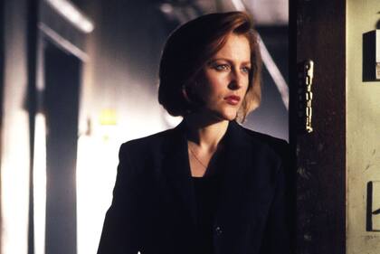 Gillian Anderson como Dana Scully