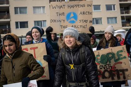 Greta Thunberg  y otros jóvenes activistas climáticos del movimiento "Viernes por el Futuro" organizan una manifestación no autorizada el día de clausura de la reunión anual del Foro Económico Mundial en Davos