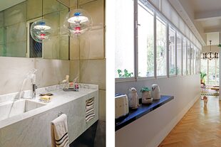 Grifería ‘Axor V’ de Philippe Starck. Revestimientos similares al hormigón armado (Bará). ‘Gris Emblemático’ (Alba) en el pasillo.