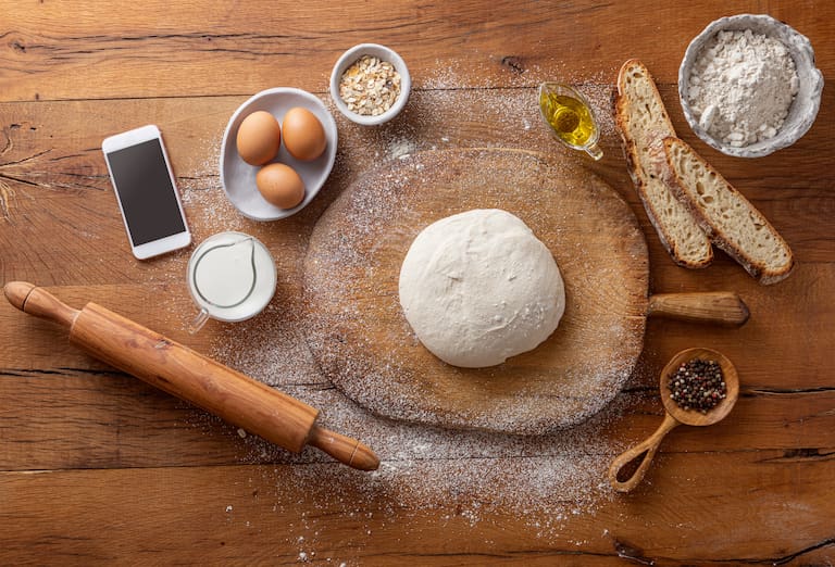 Preparing,Dough,For,Baking,With,Mobile,Phone