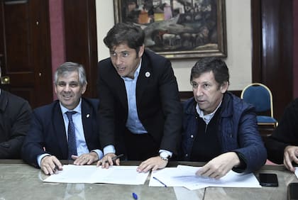 Guillermo Britos, con Kicillof y Posse