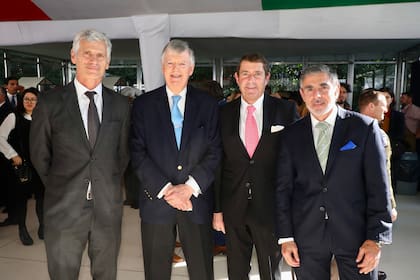 Guillermo Tempesta, presidente de Banco Santander, Guillermo Stanley, Carlos Giovanelli, presidente de Havanna y Damián Pozzoli