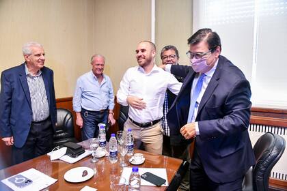 Guzmán y Moroni, con gremialistas en la CGT