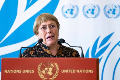 HANDOUT - 13 June 2022, Switzerland, Geneva: Michelle Bachelet, UN High Commissioner for Human Rights, speaks during a press conference after the 50th session of the UN Human Rights Council. Photo: Jean Marc Ferré/UN Photo/dpa - ATTENTION: editorial use only and only if the credit mentioned above is referenced in full