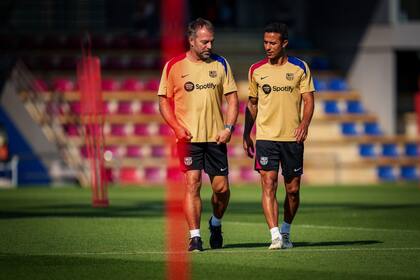 Hansi Flick junto a Thiago Alcántara