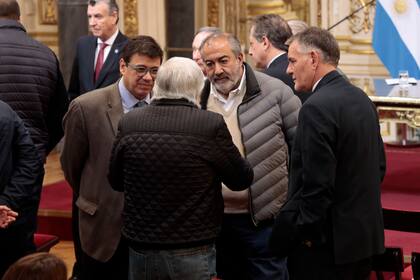Héctor Daer, Carlos Castagneto, Hugo Moyano y el ministro de Trabajo, Claudio Moroni, en la Casa Rosada
