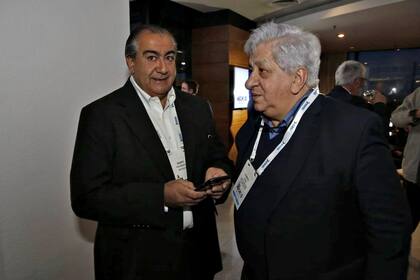 Los sindicalistas Héctor Daer (Sanidad) y Julio Piumato (Judiciales)