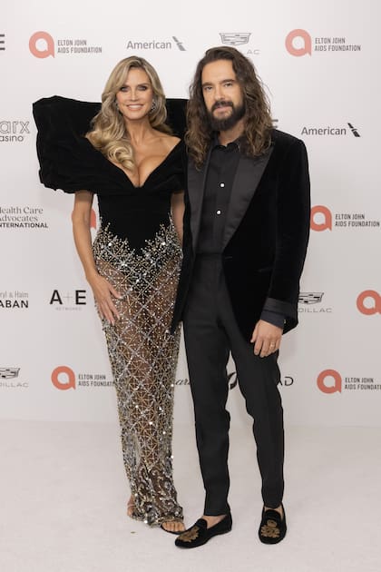Heidi Klum, con un vestido de Valdrin Sahiti, junto a su marido, el compositor y guitarrista Tom Kaulitz
