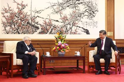 Henry Kissinger y Xi Jinping