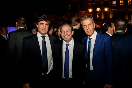 Hernán Lacunza, Nicolás Caputo y Martín Redrado.