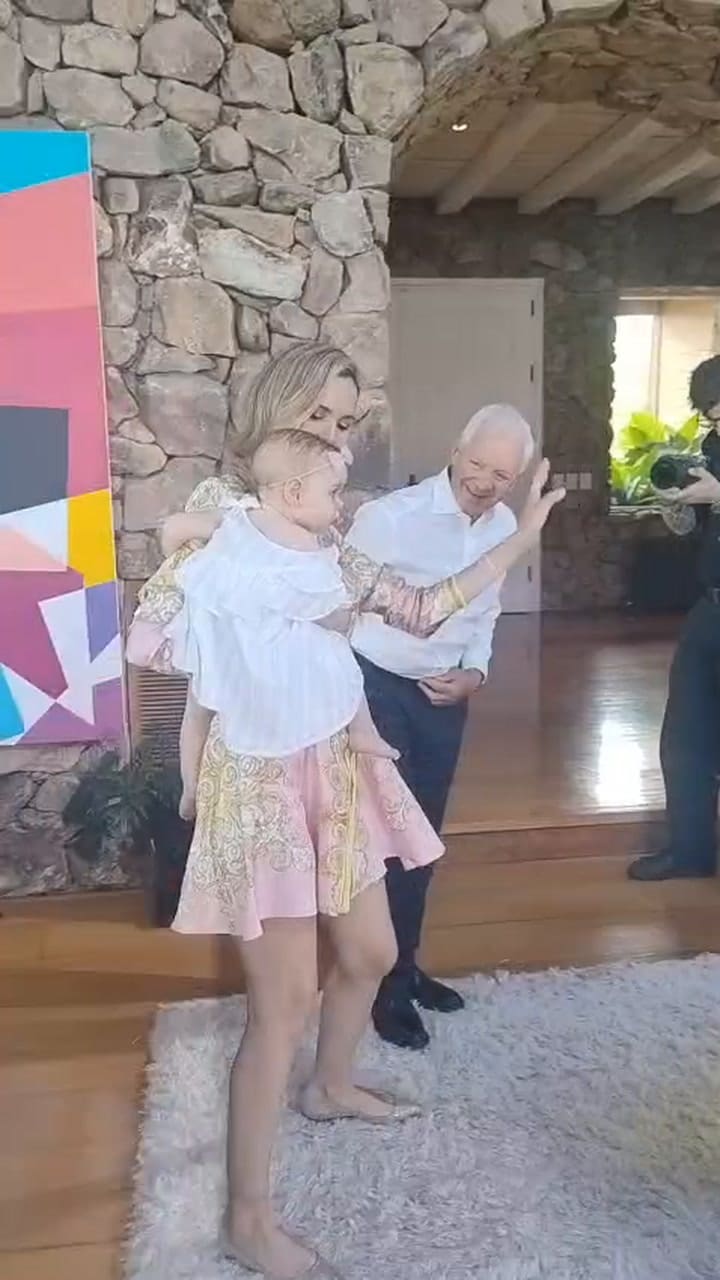 Eduardo, Elina and Kahlo dance to the rhythm of the gospel choir that sang during lunch