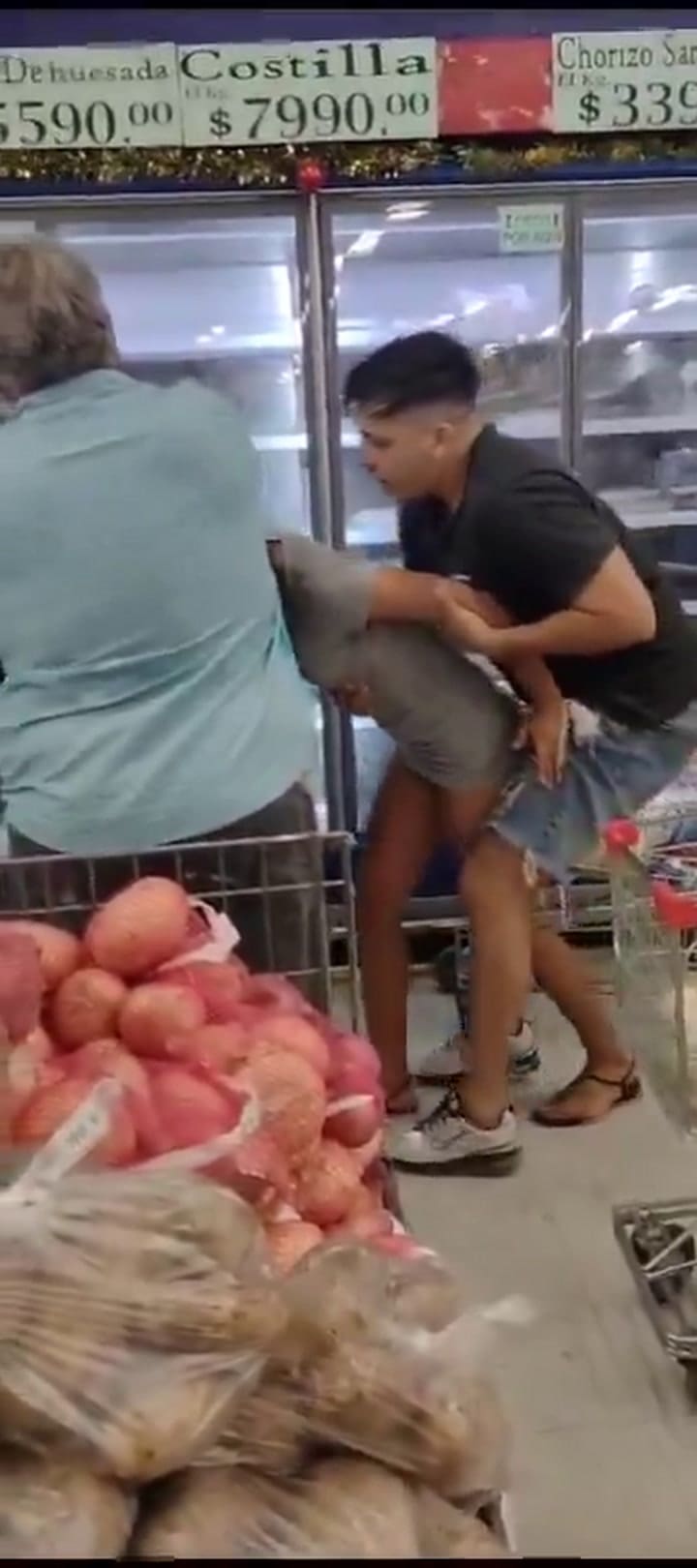Pelea supermercado
