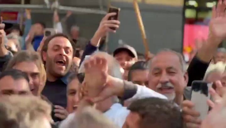 Sergio Massa y Guillermo Moreno en la marcha universitaria