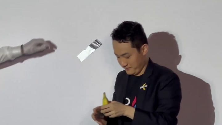 EATS THE BANANA TAPED TO THE WALL THAT HE BOUGHT FOR $6.2M