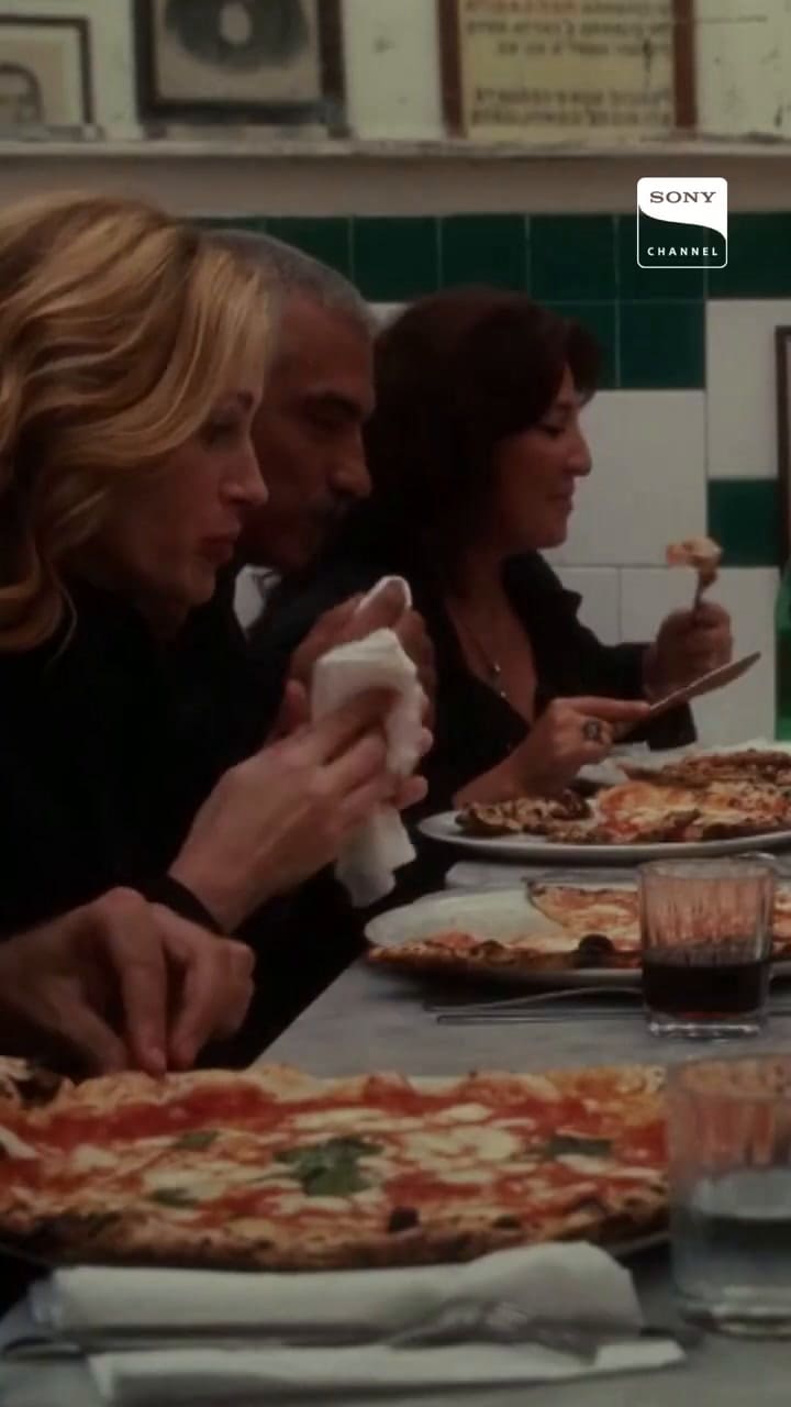 Julia Roberts come pizza Margarita en Comer, rezar, amar
