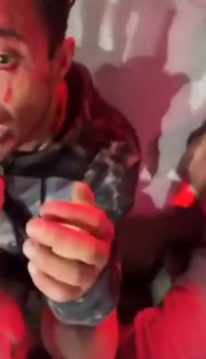 Desnudos, ensangrentados y pidiendo perdón: el video de los hinchas chilenos grabado por la barra de Independiente