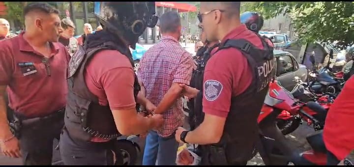 Detención botellazo