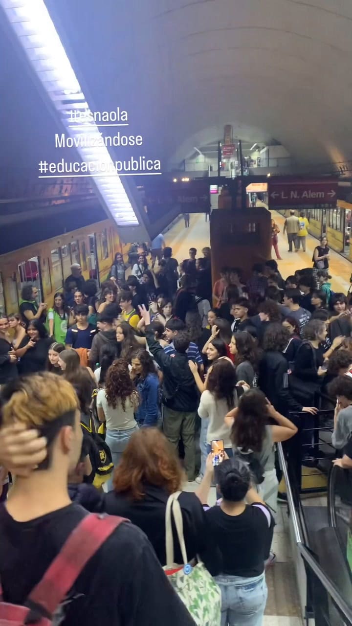 Walas y Richard Coleman en la marcha universitaria
