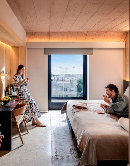 Hualta espera con suites amplias y cálidas en pleno corazón de la ciudad.