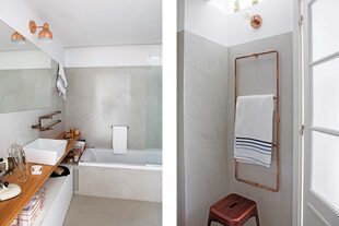 Igual que en el toilette, el baño de la suite tiene cañerías, grifería y toallero cobreados, hechos en obra. Una lucarna suma luz natural.