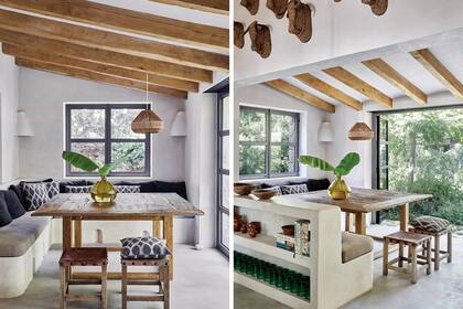 Igual que los muebles, los bancos del comedor diario se hicieron en cemento. Se acompañaron con una mesa rústica y banquetas en madera y cuero.