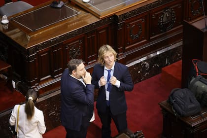 Iñaki Gutierrez y el cineasta presidencial Oría
