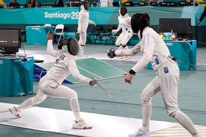 Isabel Di Tella, a la derecha, en la final panamericana con la competidora peruana