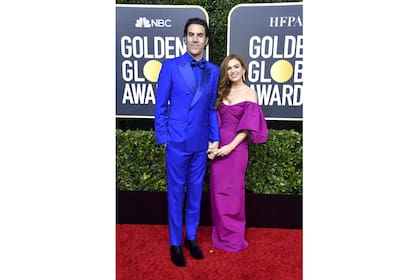 Isla Fisher y Sacha Baron Cohen en una alfombra roja